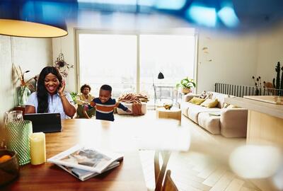 family scenes sitting at the kitchen table working