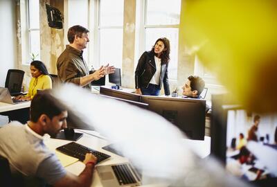 Group in an office having a conversation