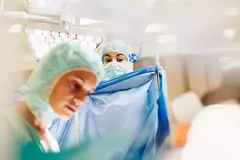 Doctors in a surgery room. 

