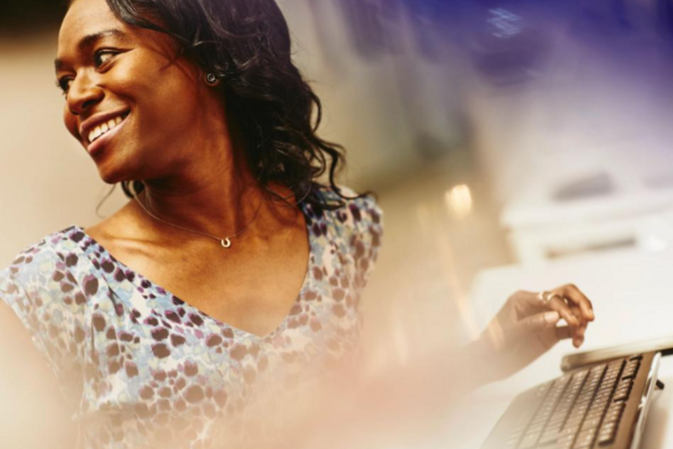 A woman smiling